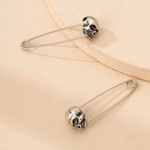 Silver safety pin skull earrings New